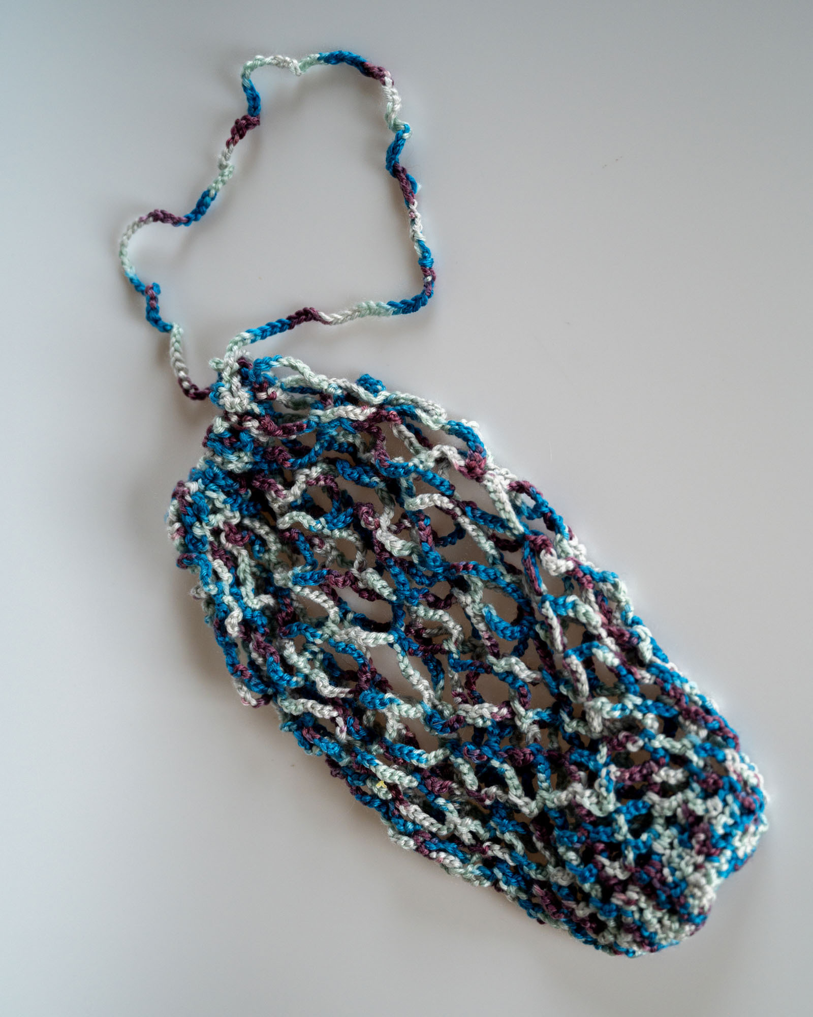 150 299 18 GG Frukt Nett Lys Grå 01